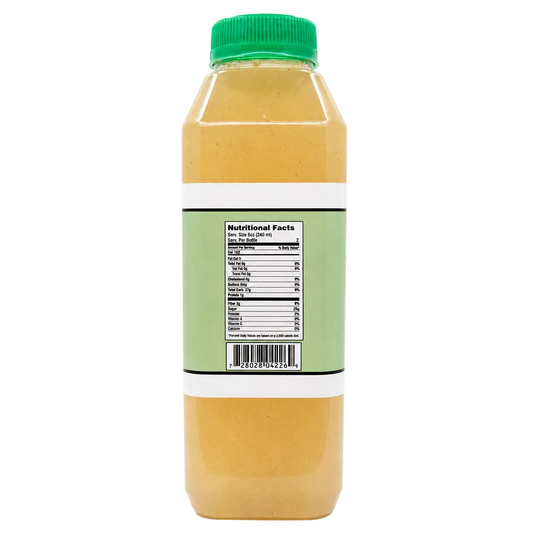 A clear plastic bottle filled with a yellow-orange liquid, featuring a green cap and a light green label with a visible Nutrition Facts panel, set against a plain white background.