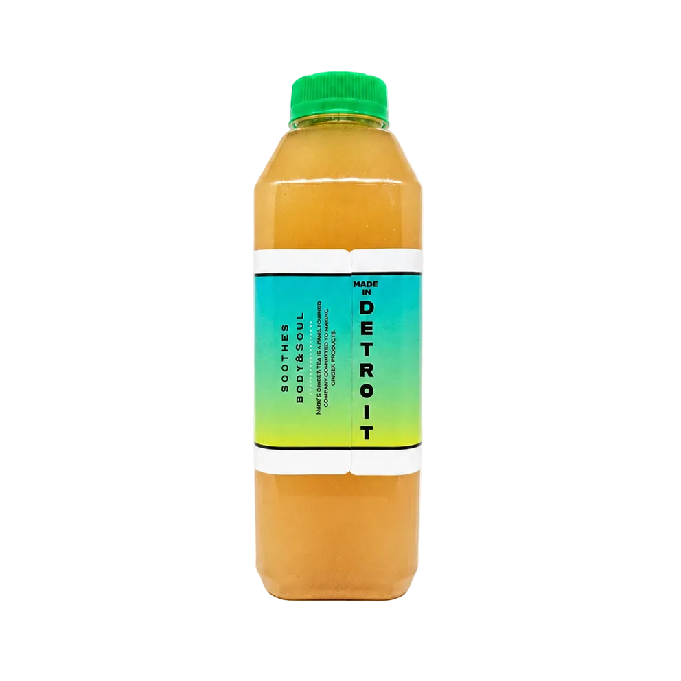 Side view of a Nikki's Ginger Tea Ginger Watermelon Lemonade bottle showing the "Made in Detroit" label text.
