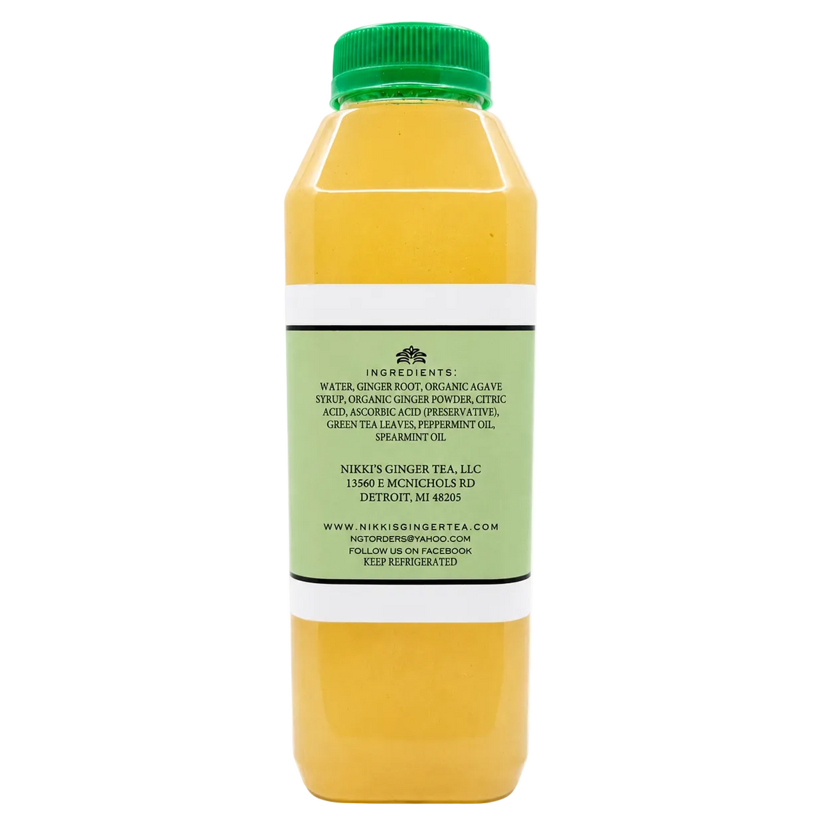 A plastic bottle of liquid herbal tea with a green cap, showing the back label with ingredients and contact details for Nikki's Ginger Tea.