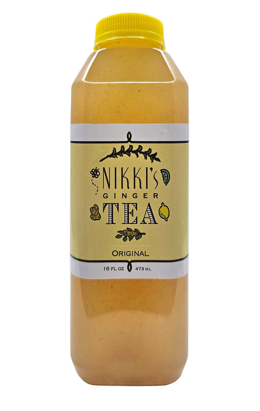 Front view of a 16 fl oz plastic bottle of Nikki's Ginger Tea Original with a yellow cap.